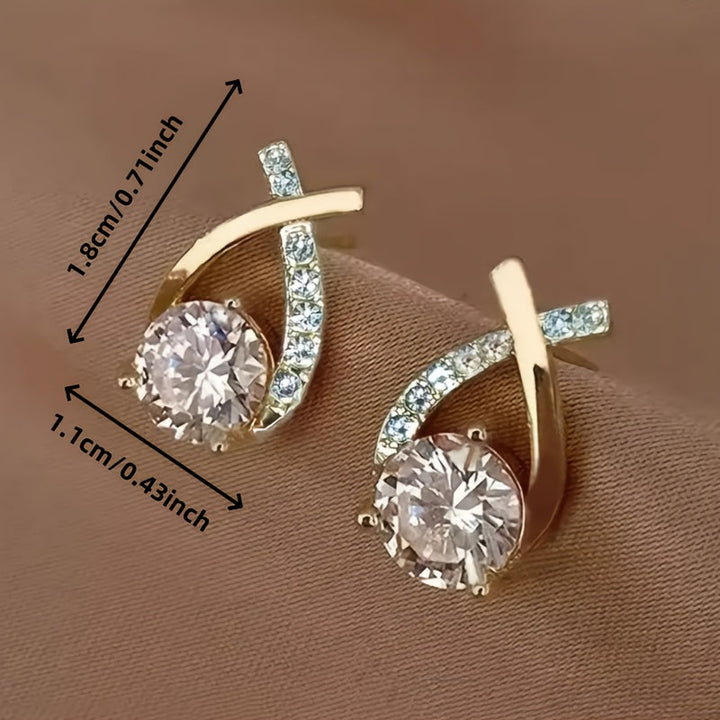 Boucles d'oreilles en puce avec croix dorée et zirconiums